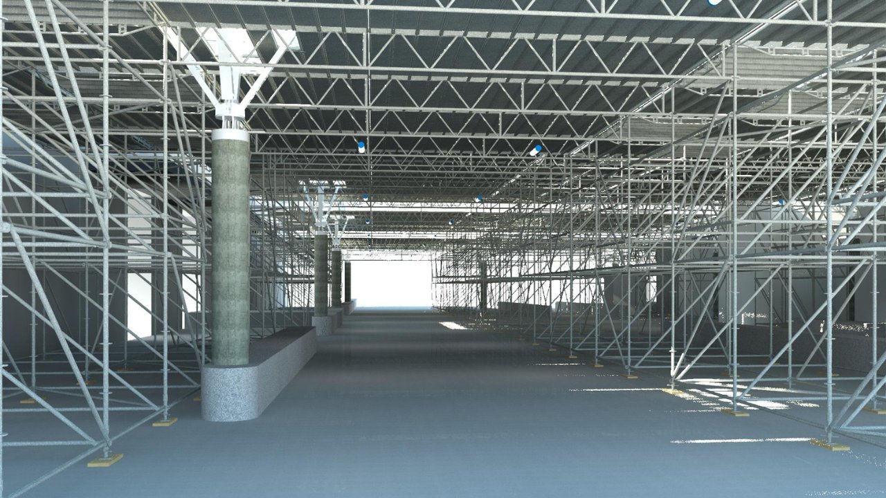 Een steigerconstructie onder een gebouw.