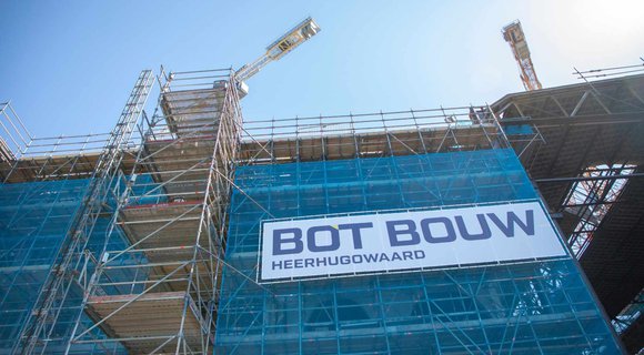 Oostenburg Amsterdam: efficiënte lift- en steigerbouw voor optimaal bouwproces